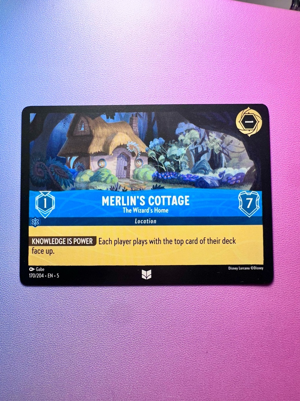 merlin’s cottage [sword in the stone] - 170/204 — lorcana: shimmering skies